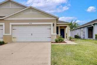Building Photo - Move-In Ready 2BR/2BA Villa with Den + 2-Car Garage | Lake Nona Adjacent | Suncrest at St. Cloud