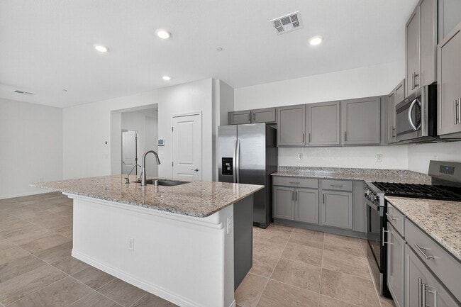 Building Photo - GENTLY USED 2024 HOME - 5 BEDROOMS WITH A FINISHED BACKYARD