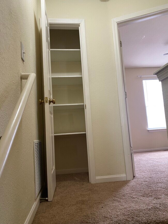Linen Closet at top of stairs - 4524 Waterloo Dr