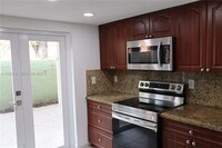 Building Photo - 10101 W Okeechobee Rd