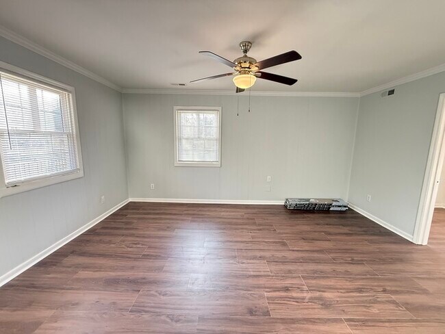 Building Photo - BIG House & BIG Fenced Yard. Plus Master Suite, Den, Shed, and More!