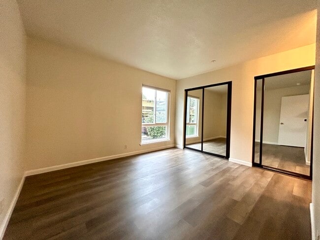 Building Photo - Beautiful Downstairs 2 Bedroom Condo Located In Gated Community Pool + Lake Access!