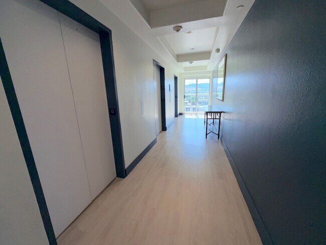 Building Photo - Riverwalk Tower 2 Bedroom Condo - 2 Parking Spaces/Private Laundry
