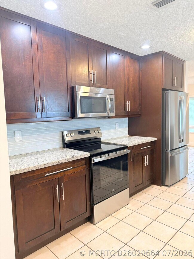Building Photo - 7797 San Marcos Pl