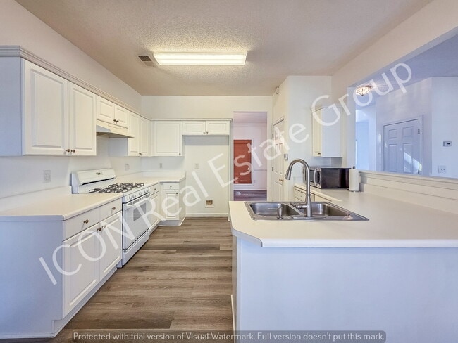 Building Photo - Move in ready 4BR/2.5BA home in a great neighborhood—tucked away on a quiet cul-de-sac!