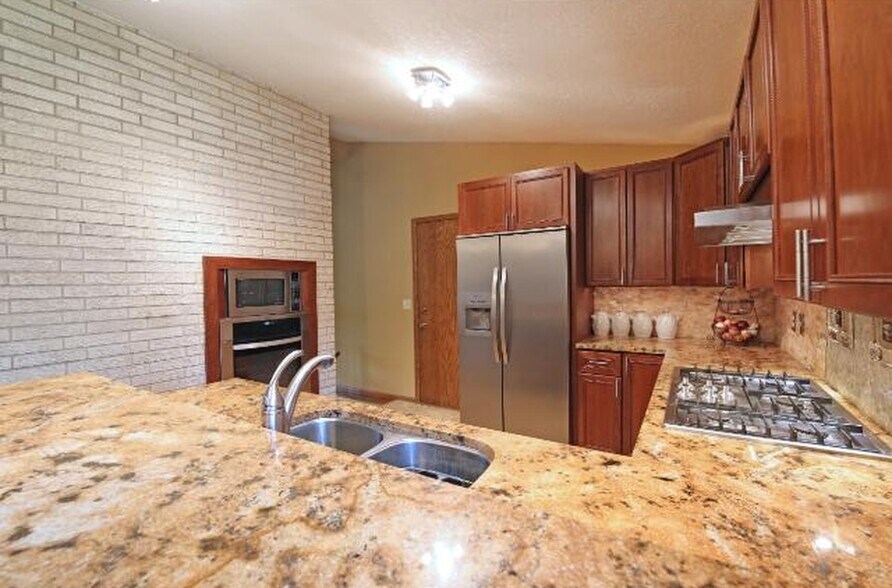 Kitchen has direct access from attached garage. - 5813 Tracy Avenue