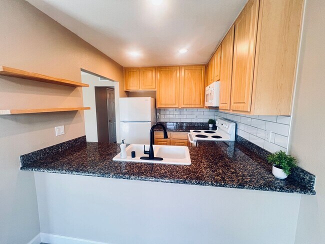 Building Photo - Lowered Price and Move In Special!! Two Bedroom Sunterra Condo in El Cajon remodeled with AC