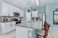 Building Photo - **Stunning 4BR/3BA Home with Dual Primary Ensuites & Modern Upgrades!**