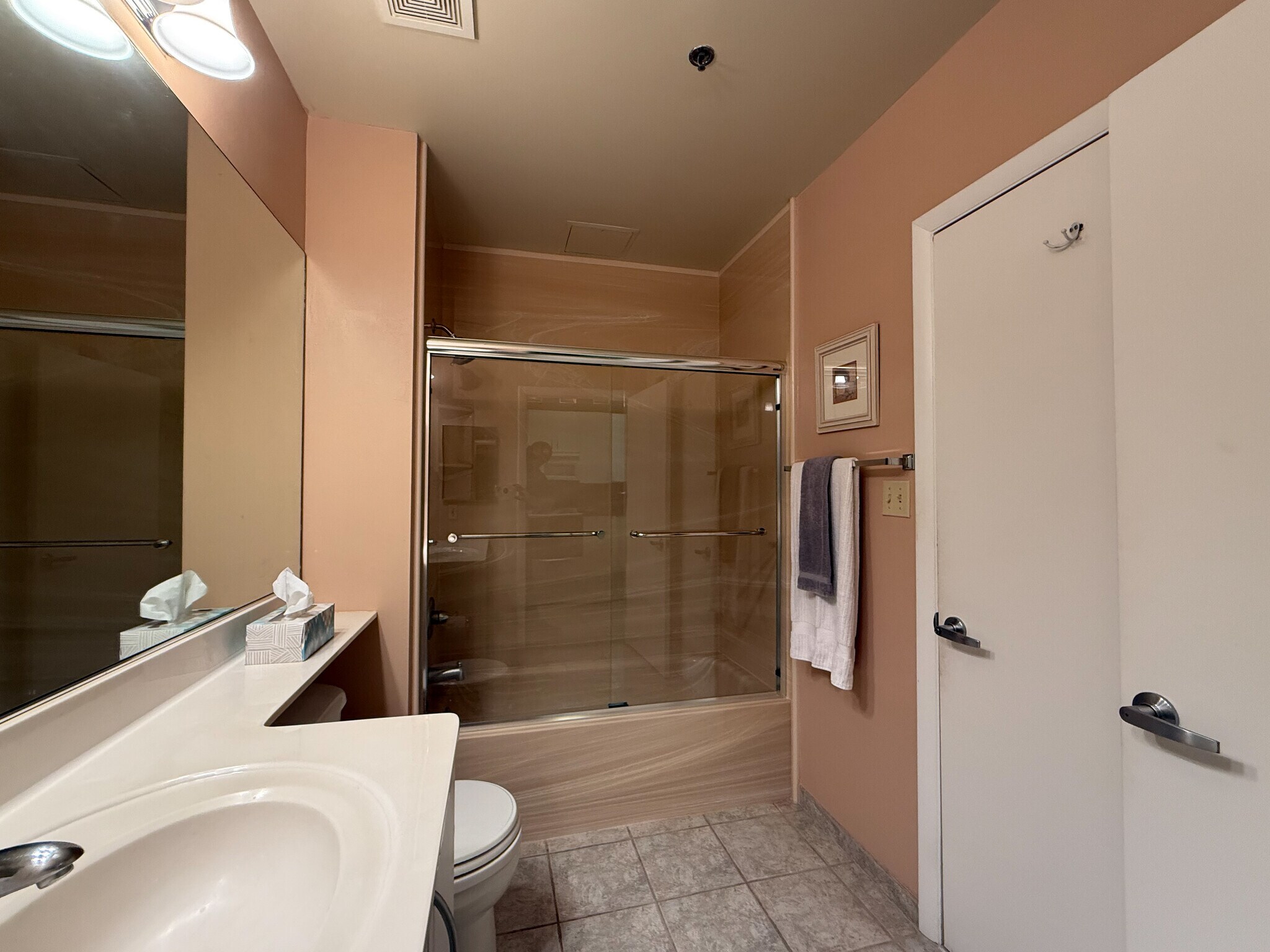 comfortable bathroom with Tub and shower. - 1300 N St NW