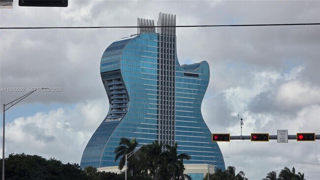 Building Photo - 2100 N 62nd Ave