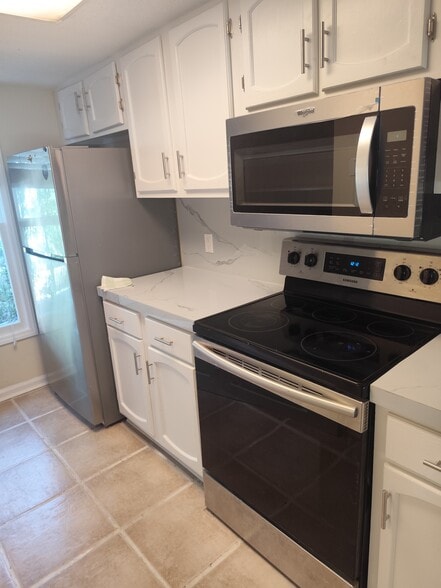 Building Photo - 306 76th Ave N