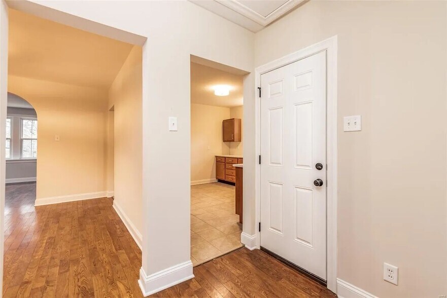 hall w/ basement/side door - 7136 Amherst Ave