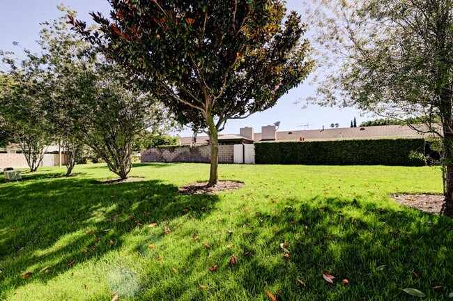 Building Photo - Updated, 3 bedroom 2.5 bath townhouse located in the Newport Riviera Community