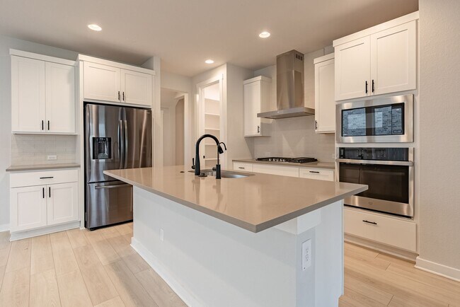 Building Photo - Spacious Buda Beauty Offering Open-Concept Living and Flexible Space for Every Lifestyle!