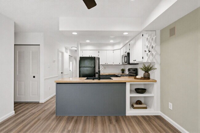 Building Photo - Unbeatable Value! Beautifully Updated 2BR/1.5BA Top-Floor Oasis in the Heart of Olney – Literally...