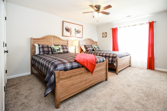 Queen beds in all secondary bedrooms, with king bed in master - 3024 Early Rise Ave