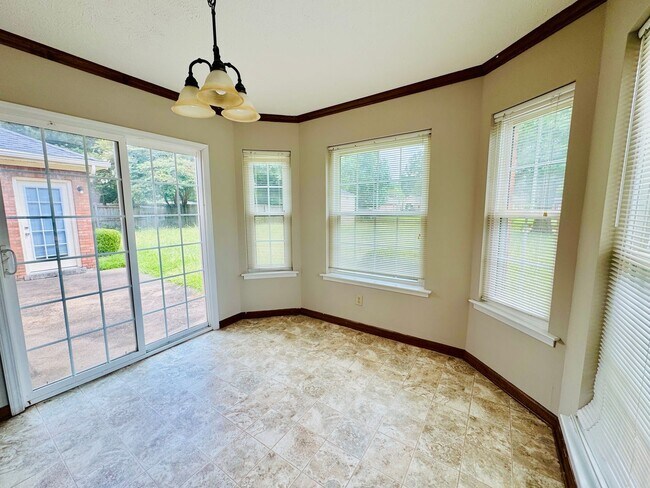 Building Photo - 3-Bedroom home is sure to captivate from t...