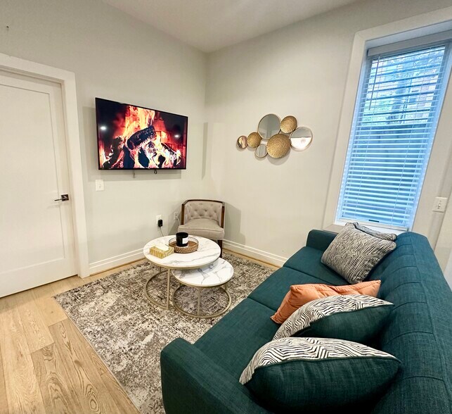 Living room, high speed Wi-Fi, sleeper sofa - 7101 Georgia Ave NW