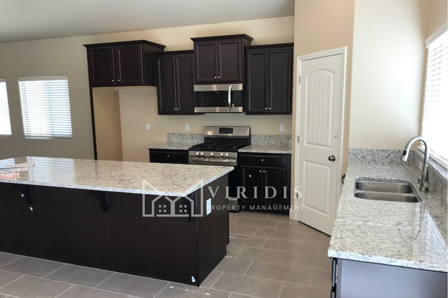 Building Photo - 5901 Blue Spruce Ave