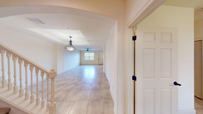 Building Photo - 4/3.5 TOWNHOME VILLA in Waterstone-Davenport