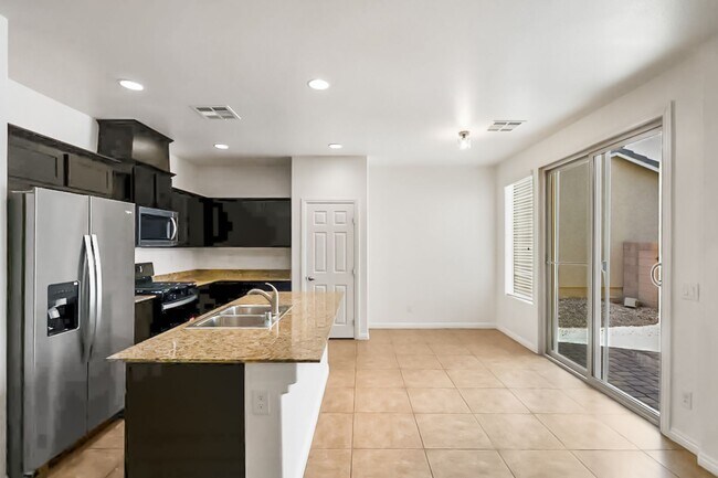 Building Photo - Nicely Upgraded Mountains Edge Gated Commu...