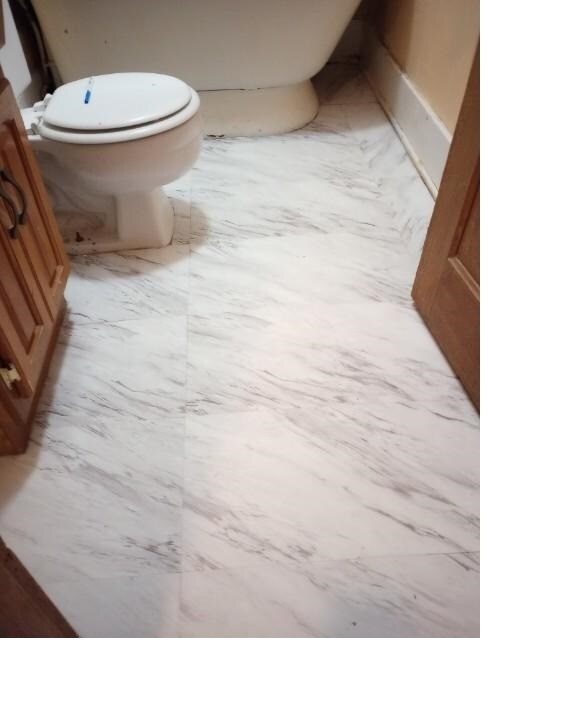 Bathroom floor - 404 Birr St
