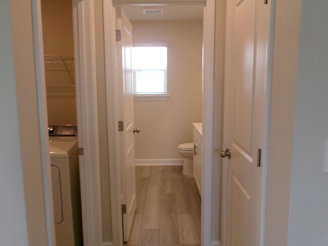 Building Photo - New 5 bedroom, 3 bath home in Clear Pond with pond view