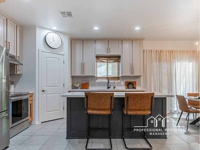Building Photo - “Modern 4-Bedroom, 2-Bathroom Solar Home in El Rancho”