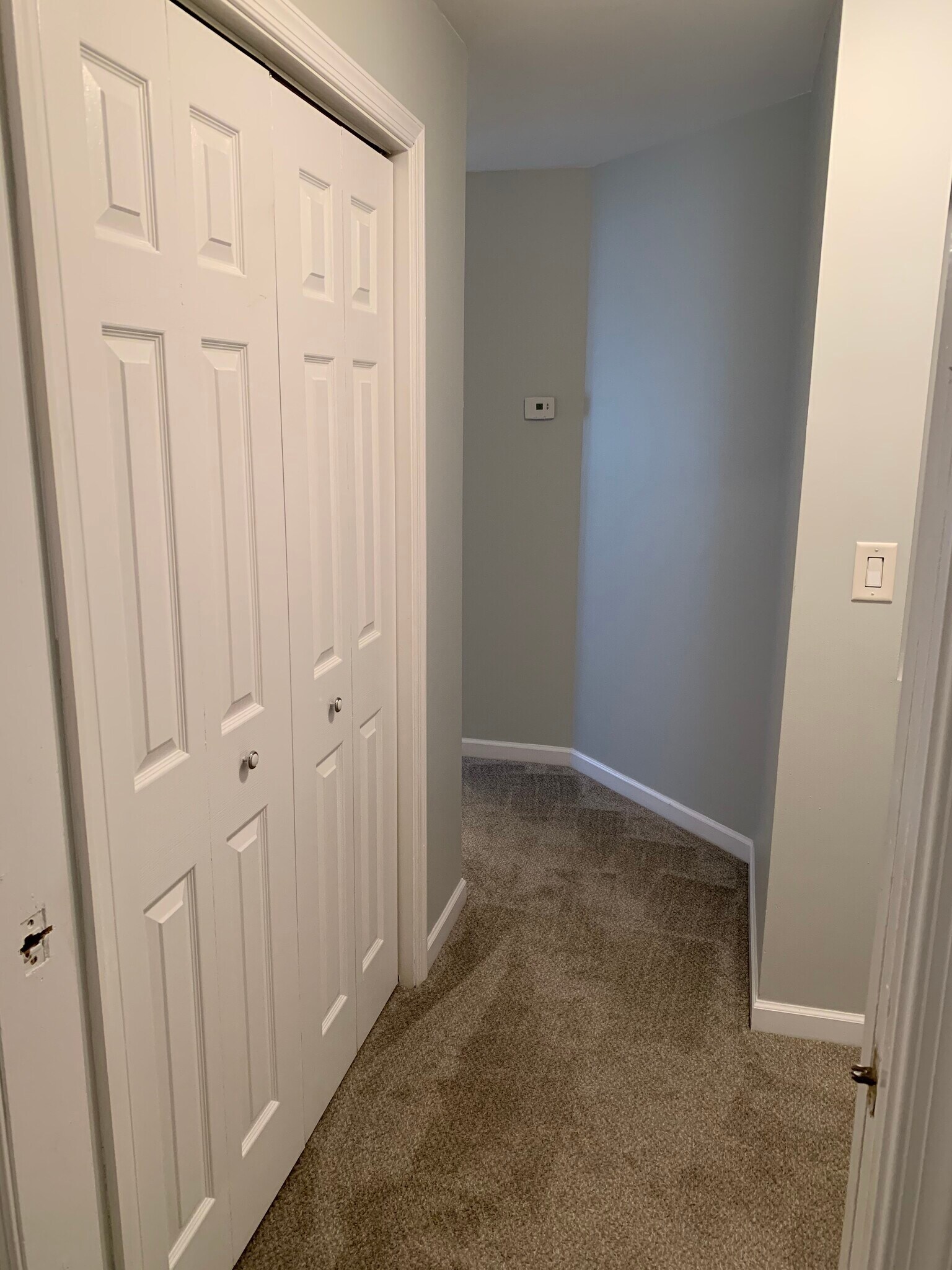 main hall w/ closet storage - 1743 Portland Ave