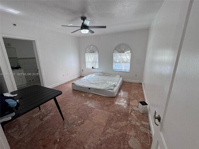 Building Photo - 9008 Collins Ave