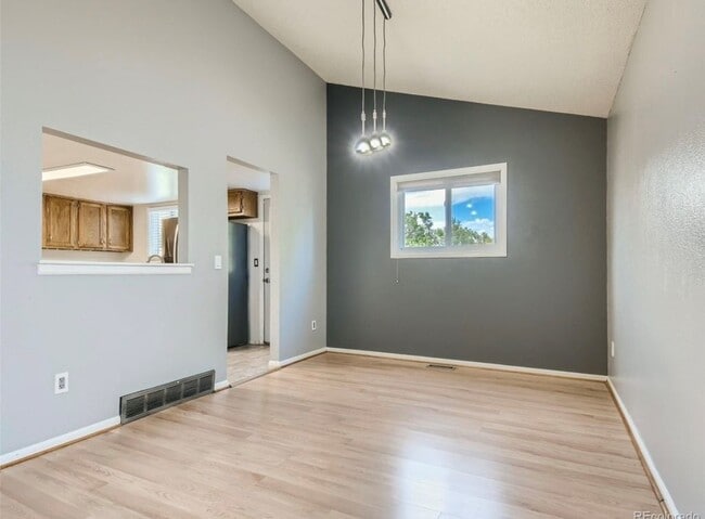 Building Photo - 1293 E 97th Ave