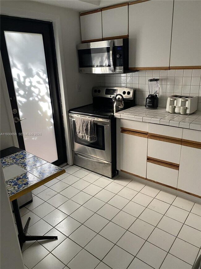 Building Photo - 8950 Collins Ave