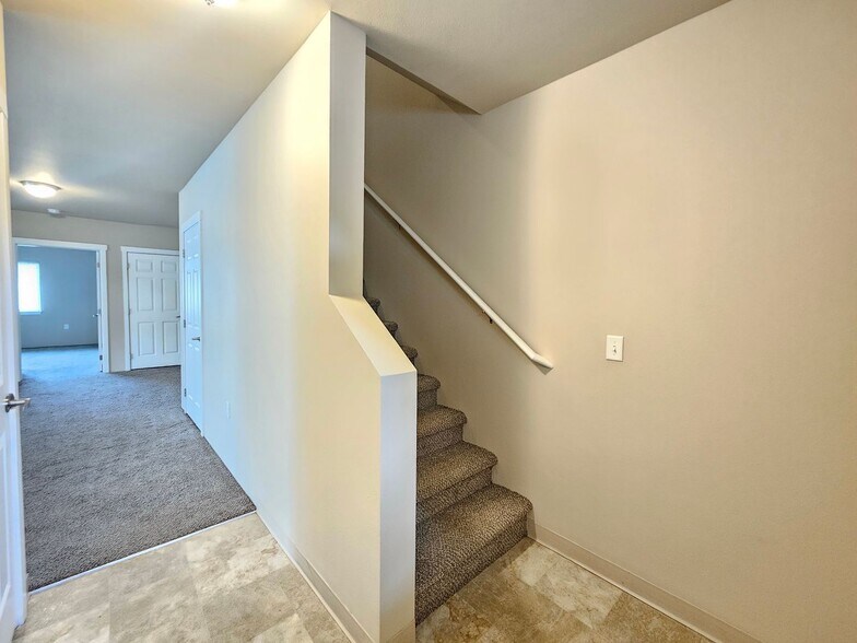 Building Photo - 5205 -5207  E. Upriver Dr.