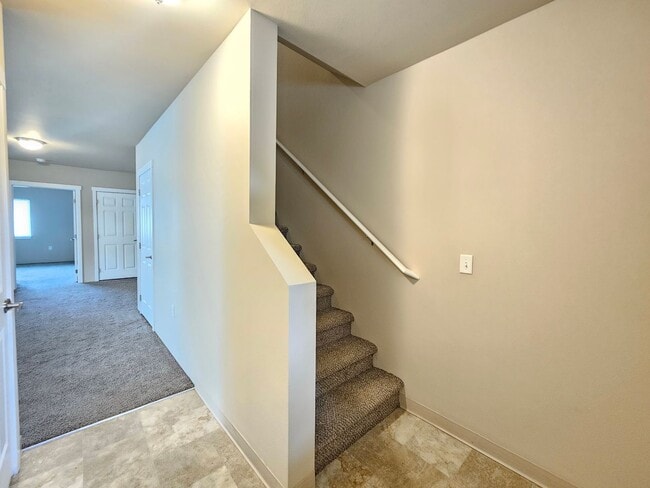 Building Photo - 5207-5207 E Upriver Dr