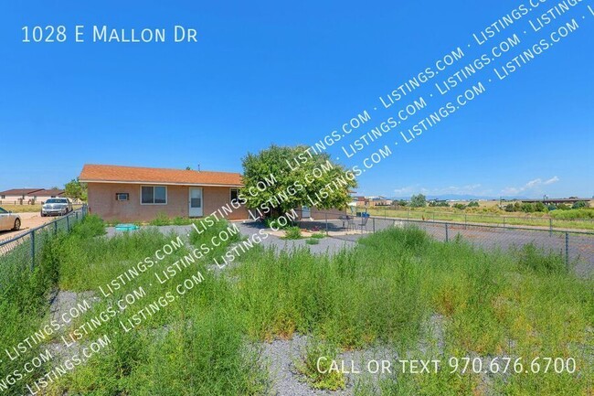 Building Photo - 1028 E Mallon Dr