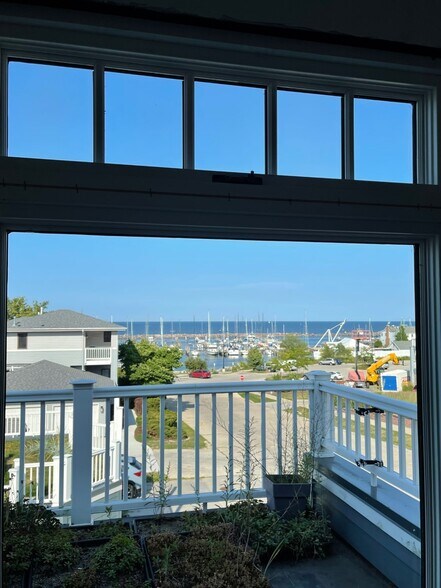 Bonus Rm/Office views of Lake Michigan and South Shore Yacht Club pier and moorings. - 2650 S Shore Dr