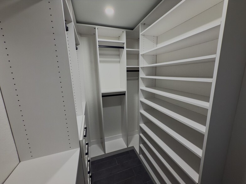 Main Large closet with versatile shoe and accessory shelving - 2006 Candle Ct