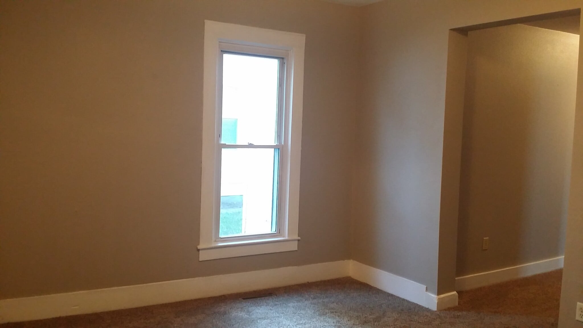 Living Room is large for a sectional, TV and a little dining area. - 723 Chippewa Street