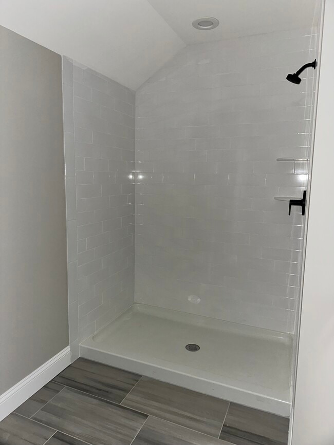 2nd floor bedroom #2 Full bathroom tile surround shower - 26 Cherry Hill Rd