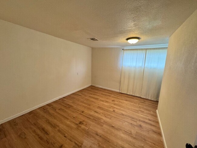 Building Photo - Conveniently Located Home with Attached Studio!