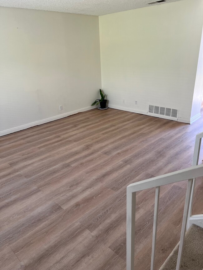 Large living room with plank flooring throughout - 2356 Canyon Park Dr