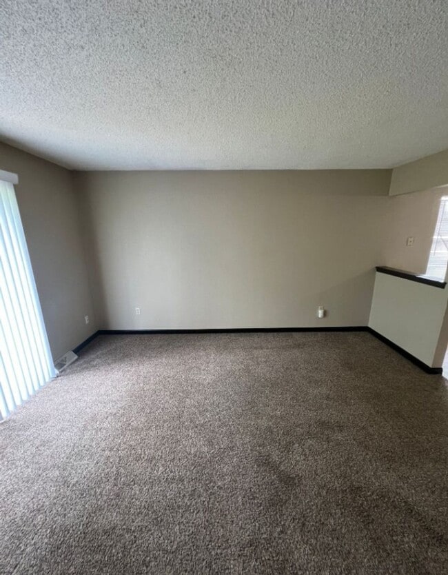 Building Photo - Spacious Duplex with Finished Basement & G...