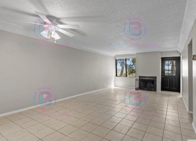 Building Photo - Incredible condo near UNR! This charming 2...