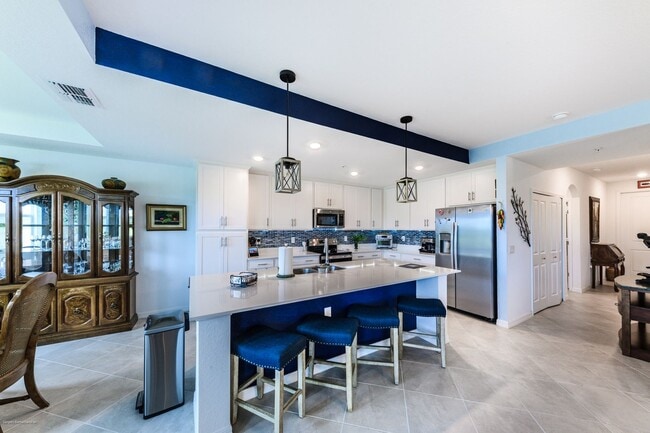 Building Photo - PET FRIENDLY- TURNKEY FURNISHED. VARIABLE RENTAL RATES