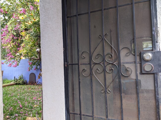 metal door in front of regular door for breez - 3771 Boise Ave