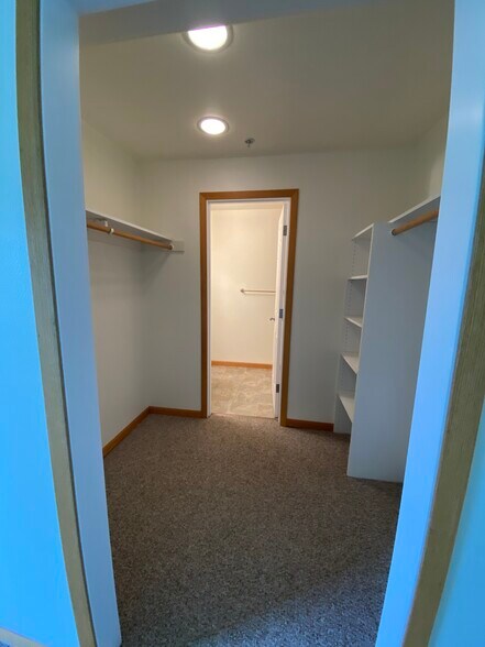 Downstairs Bd Closet 2 / Entry to Bath - 425 SE Shell Ave