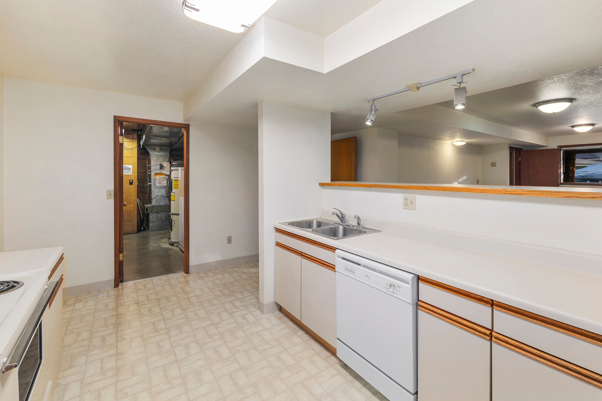 second kitchen leading into laundry room - 16758 45th Ave NE