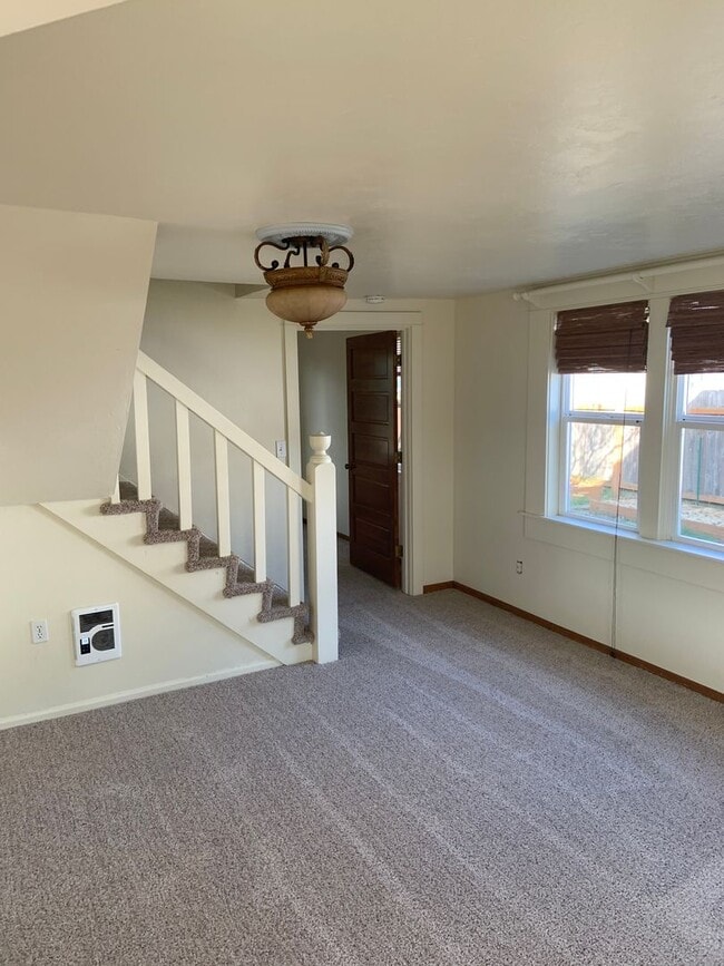 Building Photo - Great Updated House with a Fabulous Front Porch and Room to Garden