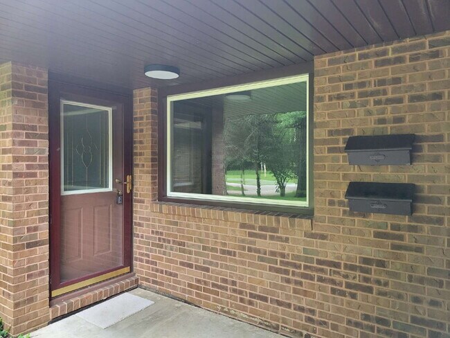 Building Photo - Rear View Mirror — Leave the Ordinary Behind
