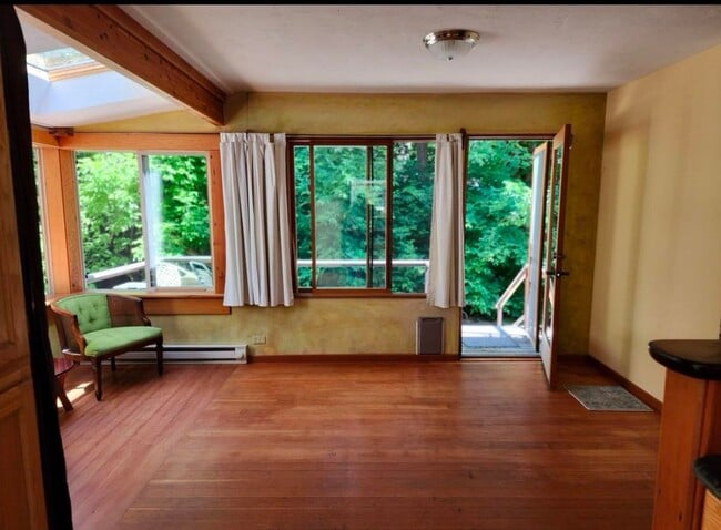 Building Photo - Renovated In-Town Home with Creek & Garage